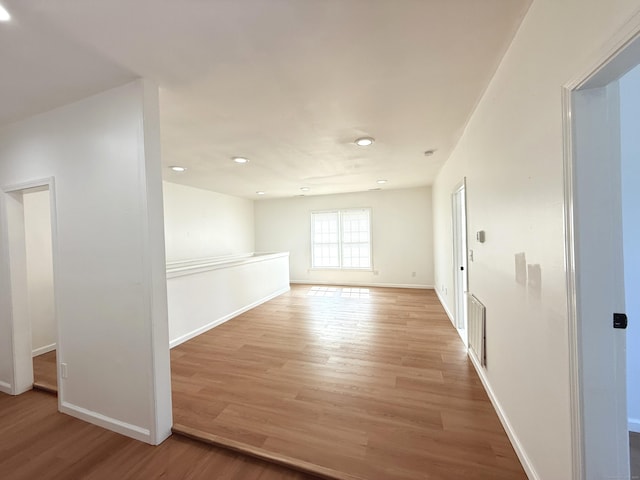 53 Cosey Beach Rd, East Haven, CT 06512 - unfurnished room featuring light wood-style floors, recessed lighting, and baseboards