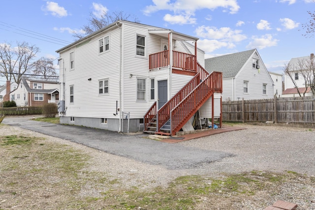 72 Maple St, Norwalk, CT 06850 - rear view of house featuring stairs