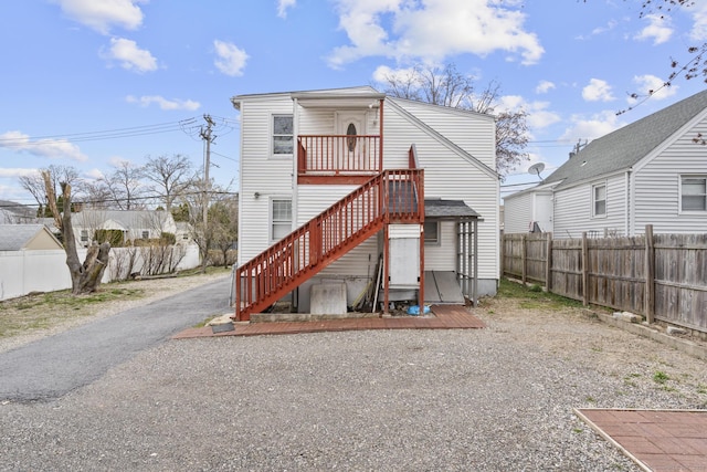 72 Maple St, Norwalk, CT 06850 - rear view of property featuring a fenced backyard