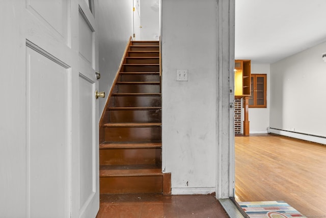 72 Maple St, Norwalk, CT 06850 - stairway featuring a baseboard heating unit