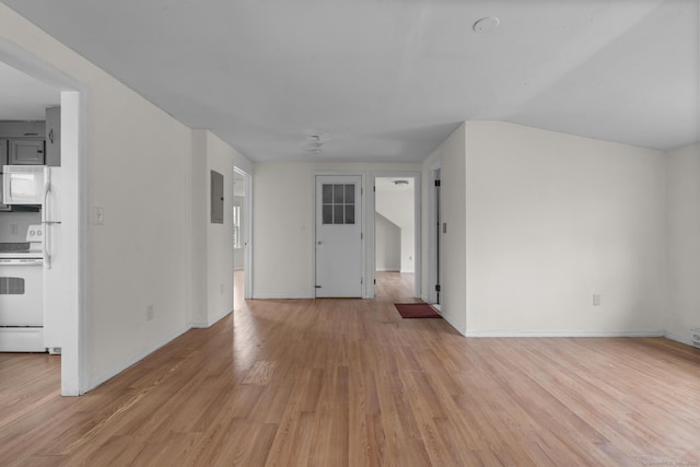 72 Maple St, Norwalk, CT 06850 - unfurnished living room with light wood-type flooring and electric panel
