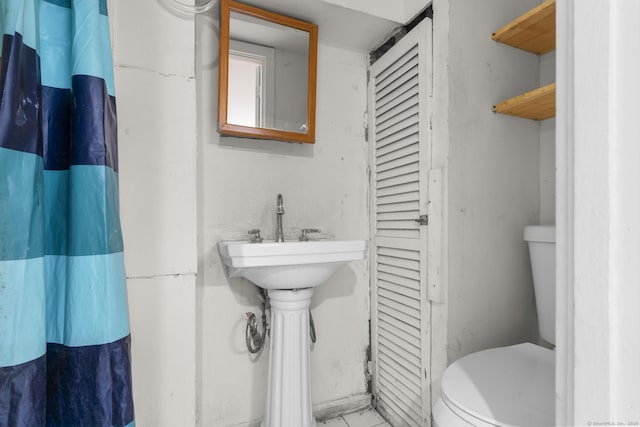 72 Maple St, Norwalk, CT 06850 - bathroom featuring a closet and tile patterned floors