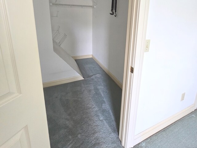 65 Ruby Ln, Stratford, CT 06614 - hallway with carpet flooring and baseboards