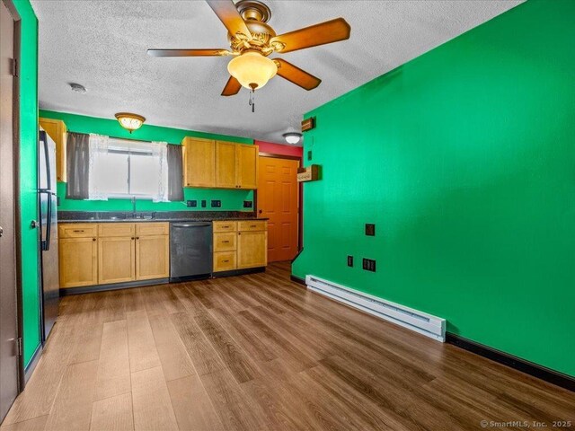 1081 New Haven Rd Apt 12F, Naugatuck, CT 06770 - kitchen with a baseboard radiator, dishwasher, a sink, a textured ceiling, and ceiling fan