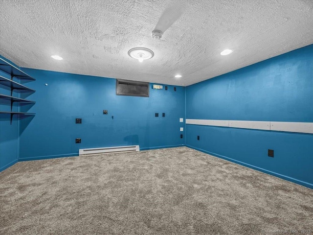 1081 New Haven Rd Apt 12F, Naugatuck, CT 06770 - carpeted empty room with baseboard heating, a textured ceiling, recessed lighting, baseboards, and a smoke detector