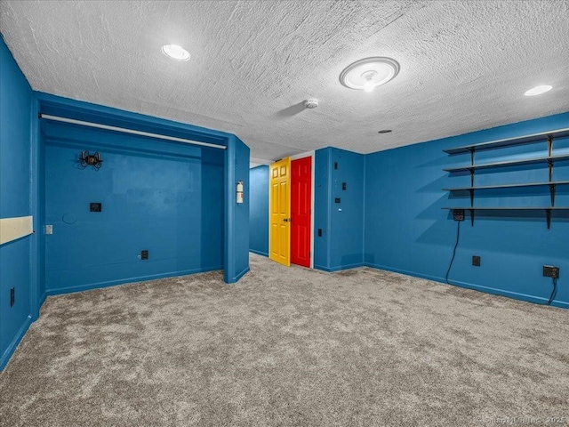 1081 New Haven Rd Apt 12F, Naugatuck, CT 06770 - unfurnished bedroom with carpet, a textured ceiling, and baseboards
