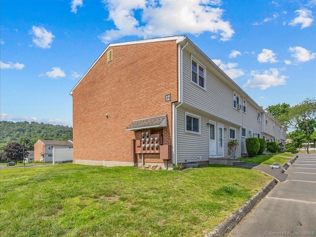 1081 New Haven Rd Apt 12F, Naugatuck, CT 06770 - view of property exterior with a yard
