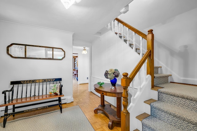 171 Still Rd, West Hartford, CT 06117 - staircase with baseboard heating and crown molding