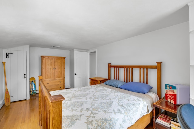 171 Still Rd, West Hartford, CT 06117 - bedroom with light wood-style floors and lofted ceiling