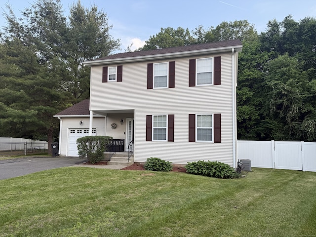24 Podunk Cir Unit 24, South Windsor, CT 06074 - view of front of house with asphalt driveway and an attached garage