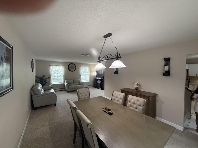 24 Podunk Cir Unit 24, South Windsor, CT 06074 - dining area with carpet flooring and a textured ceiling