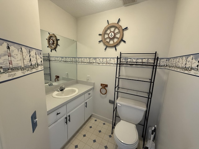 24 Podunk Cir Unit 24, South Windsor, CT 06074 - bathroom with vanity and a textured ceiling