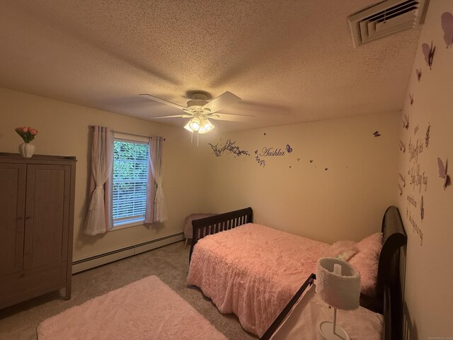 24 Podunk Cir Unit 24, South Windsor, CT 06074 - bedroom featuring a baseboard heating unit, carpet floors, a textured ceiling, and a ceiling fan