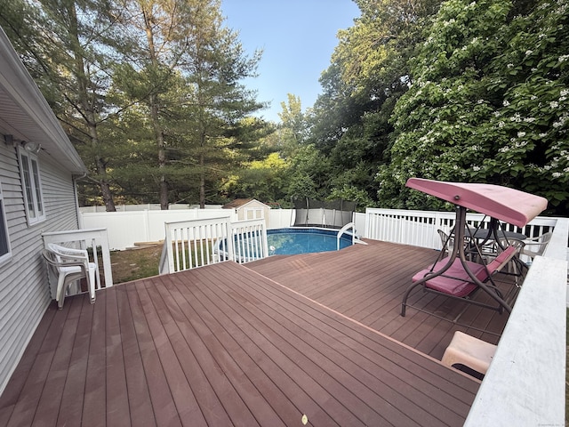 24 Podunk Cir Unit 24, South Windsor, CT 06074 - deck featuring a fenced backyard and a shed