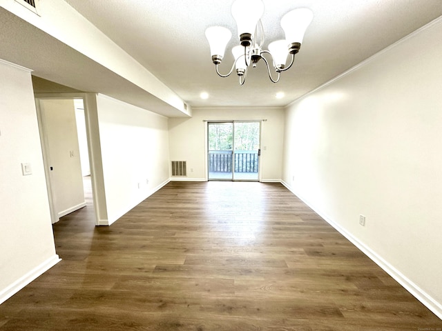 1 Concorde Way Unit B3, Windsor Locks, CT 06096 - empty room with a chandelier, baseboards, dark wood-style floors, ornamental molding, and recessed lighting