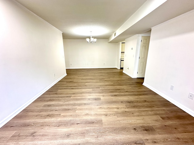 1 Concorde Way Unit B3, Windsor Locks, CT 06096 - unfurnished room featuring a chandelier, baseboards, and wood finished floors