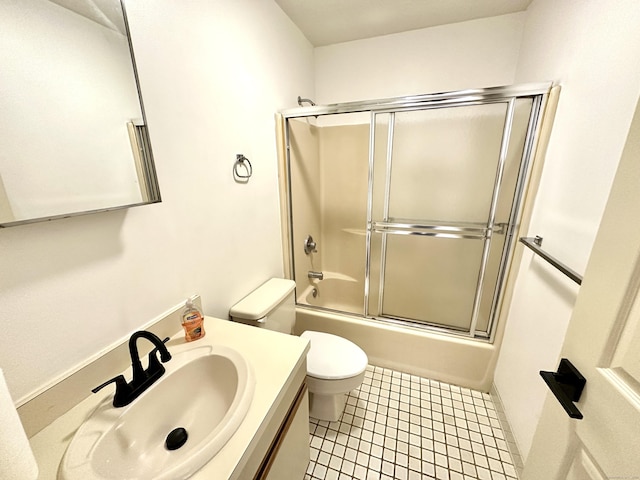 1 Concorde Way Unit B3, Windsor Locks, CT 06096 - bathroom featuring toilet, bath / shower combo with glass door, and vanity