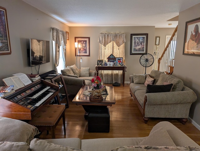 190 Sunnydale Ave, Bristol, CT 06010 - living room featuring wood finished floors, stairs, and baseboards