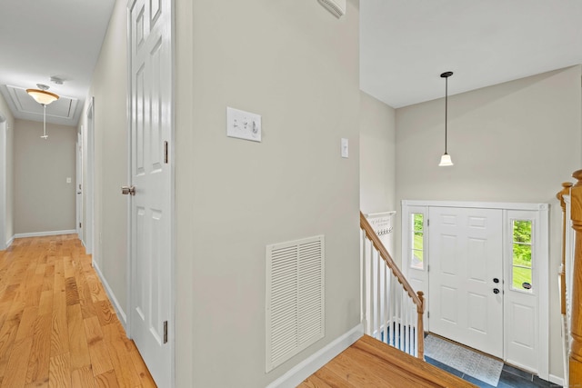 43 Old Young St, East Hampton, CT 06424 - foyer featuring light wood-style flooring and a high ceiling