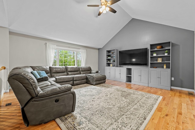 43 Old Young St, East Hampton, CT 06424 - living area with a ceiling fan, vaulted ceiling, and light wood-type flooring