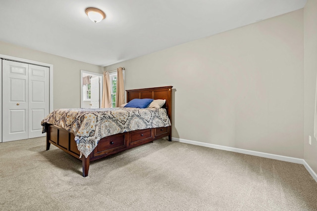 43 Old Young St, East Hampton, CT 06424 - bedroom with light colored carpet and a closet