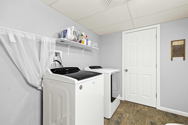 43 Old Young St, East Hampton, CT 06424 - washroom featuring washer and dryer and dark stone finish floors