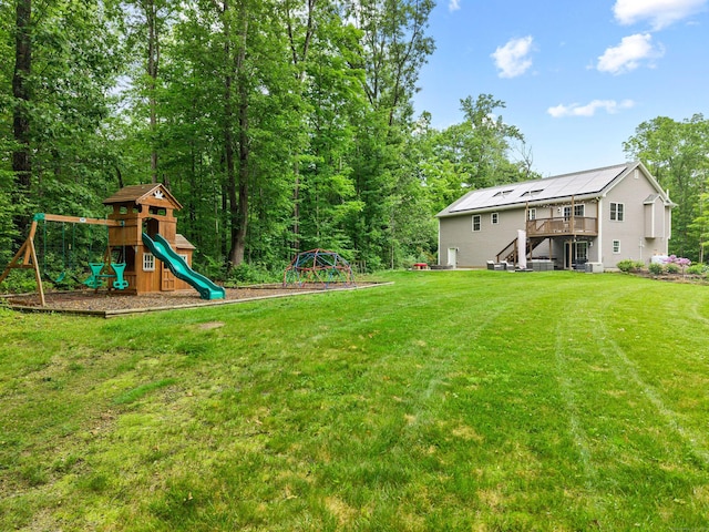 43 Old Young St, East Hampton, CT 06424 - view of grassy yard with a playground, stairway, and a deck