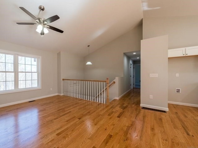 12 S St, Brooklyn, CT 06234 - unfurnished room featuring a ceiling fan, high vaulted ceiling, light wood-style flooring, and baseboards