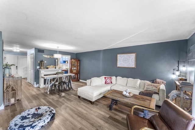 6 Mountain Laurel Ct Unit 6, Cromwell, CT 06416 - living area featuring wood finished floors and baseboards