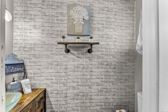 6 Mountain Laurel Ct Unit 6, Cromwell, CT 06416 - half bath with toilet, brick wall, and vanity