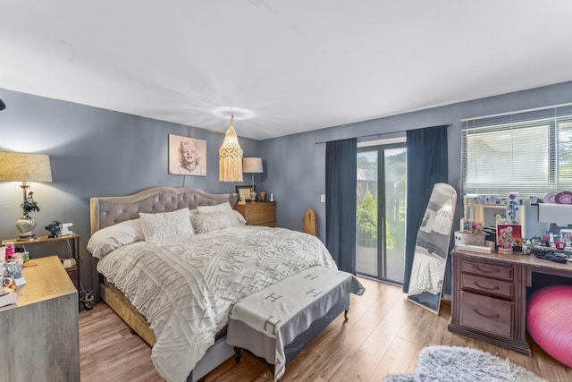 6 Mountain Laurel Ct Unit 6, Cromwell, CT 06416 - bedroom featuring access to exterior and wood finished floors