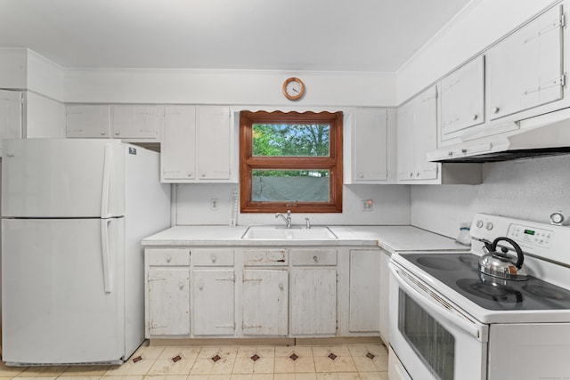 120 Pulaski Hwy, Ansonia, CT 06401 - kitchen featuring white appliances, under cabinet range hood, light countertops, crown molding, and white cabinets