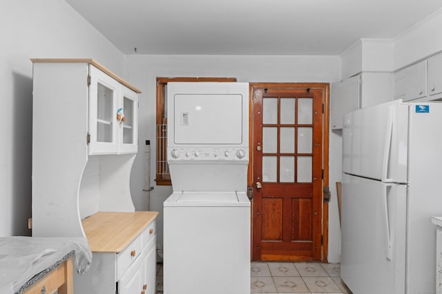 120 Pulaski Hwy, Ansonia, CT 06401 - laundry area featuring stacked washer / drying machine