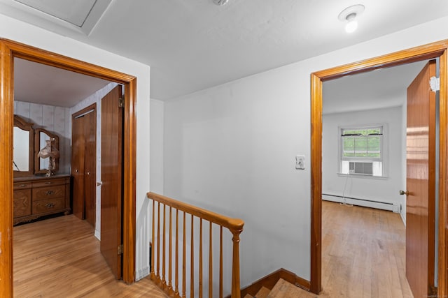 120 Pulaski Hwy, Ansonia, CT 06401 - hallway with a baseboard heating unit, an upstairs landing, wood finished floors, and cooling unit