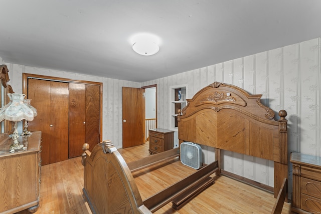 120 Pulaski Hwy, Ansonia, CT 06401 - bedroom with light wood-type flooring, wallpapered walls, and a closet