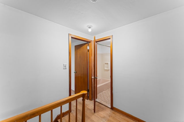 120 Pulaski Hwy, Ansonia, CT 06401 - corridor with light wood finished floors and an upstairs landing