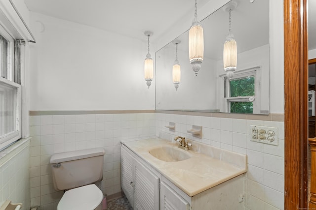 120 Pulaski Hwy, Ansonia, CT 06401 - half bath featuring tile walls, vanity, and a wainscoted wall