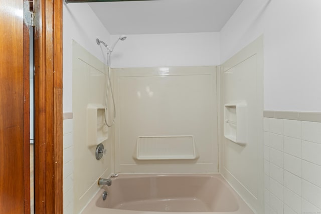 120 Pulaski Hwy, Ansonia, CT 06401 - bathroom featuring washtub / shower combination and tile walls