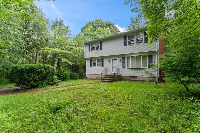 120 Pulaski Hwy, Ansonia, CT 06401 - colonial-style house with a chimney and a front yard