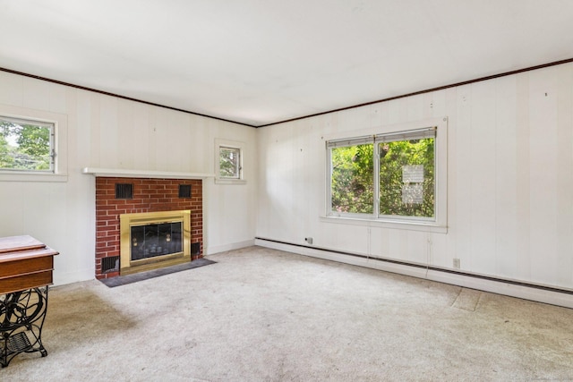 44 Nod Rd, Clinton, CT 06413 - unfurnished living room with a baseboard heating unit, plenty of natural light, a brick fireplace, carpet flooring, and wood walls