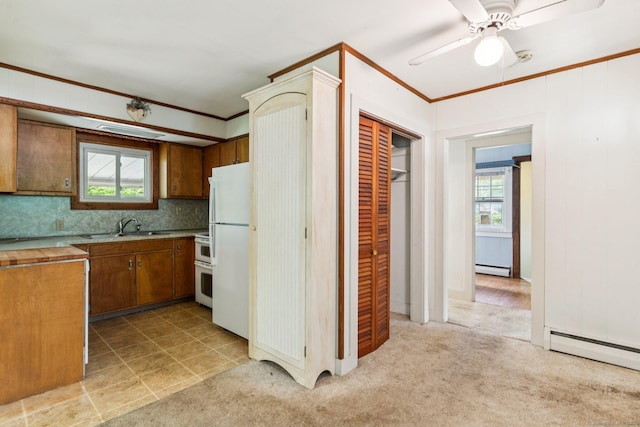 44 Nod Rd, Clinton, CT 06413 - kitchen featuring freestanding refrigerator, healthy amount of natural light, a sink, light countertops, and ornamental molding