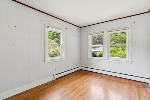 44 Nod Rd, Clinton, CT 06413 - unfurnished room featuring wood-type flooring, ornamental molding, wooden walls, and baseboards