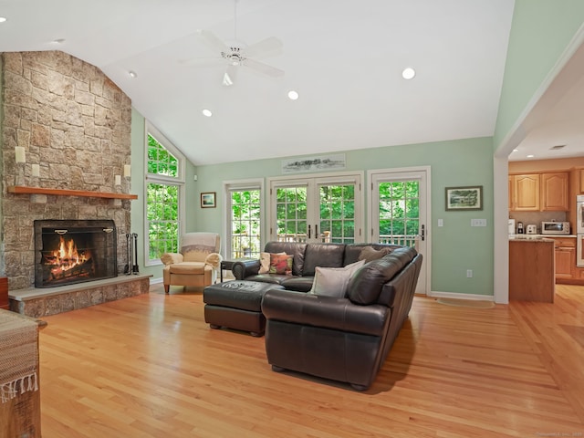 52 Grumman Ave, Wilton, CT 06897 - living area with a stone fireplace, light wood-style floors, high vaulted ceiling, a ceiling fan, and recessed lighting