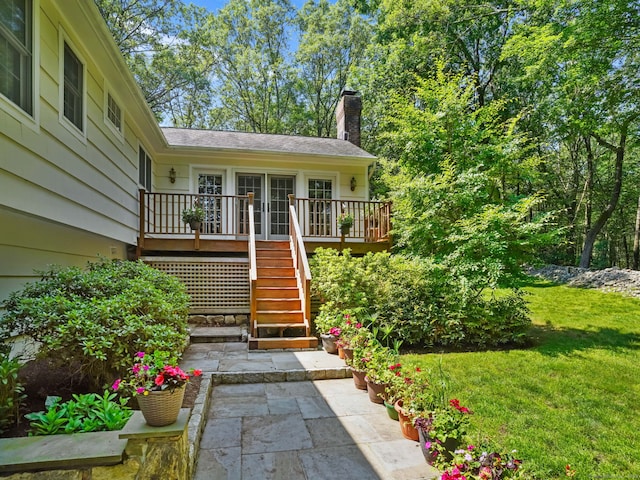 52 Grumman Ave, Wilton, CT 06897 - entrance to property featuring a deck, a chimney, and a yard