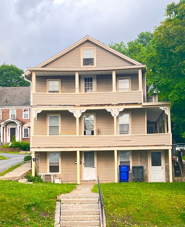 238 E Main St, Torrington, CT 06790 - view of front of home with a front yard