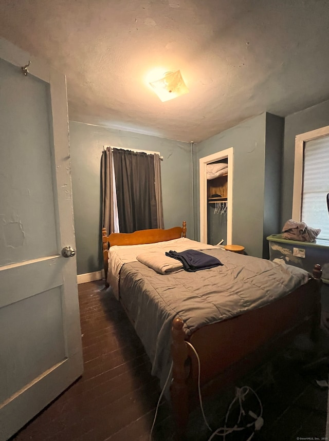 238 E Main St, Torrington, CT 06790 - bedroom featuring dark wood-type flooring and baseboards