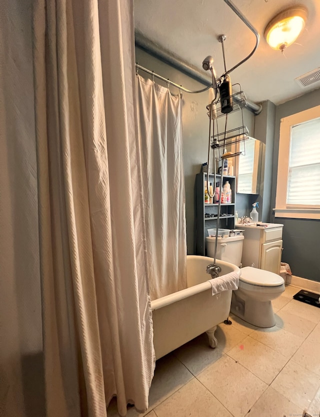 238 E Main St, Torrington, CT 06790 - bathroom featuring shower / bath combo with shower curtain, tile patterned flooring, and vanity
