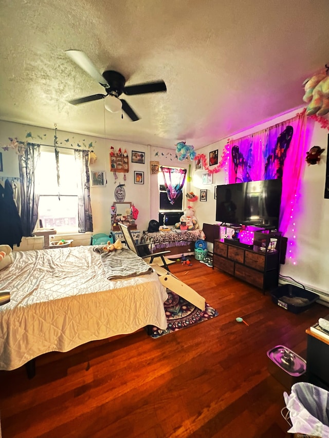 238 E Main St, Torrington, CT 06790 - bedroom featuring a textured ceiling, wood finished floors, and ceiling fan