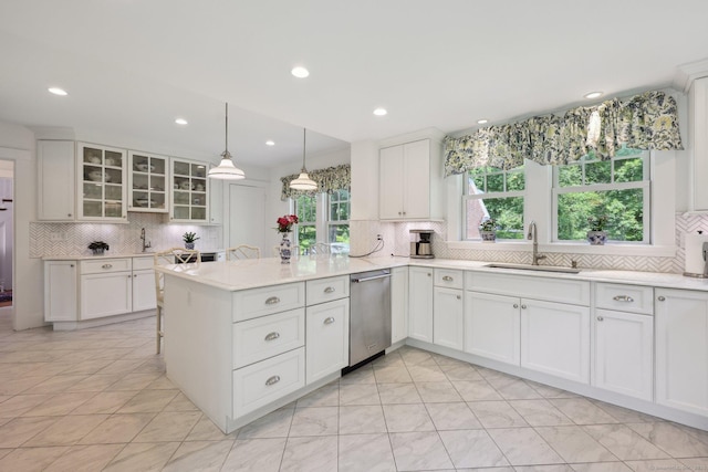 2200 Ridge Rd, North Haven, CT 06473 - kitchen with dishwasher, backsplash, a peninsula, and recessed lighting
