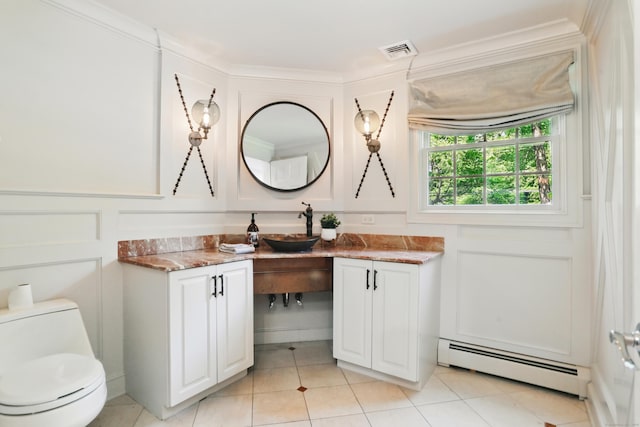 158 Linden Tree Rd, Wilton, CT 06897 - bathroom with a baseboard radiator, vanity, tile patterned floors, a decorative wall, and crown molding